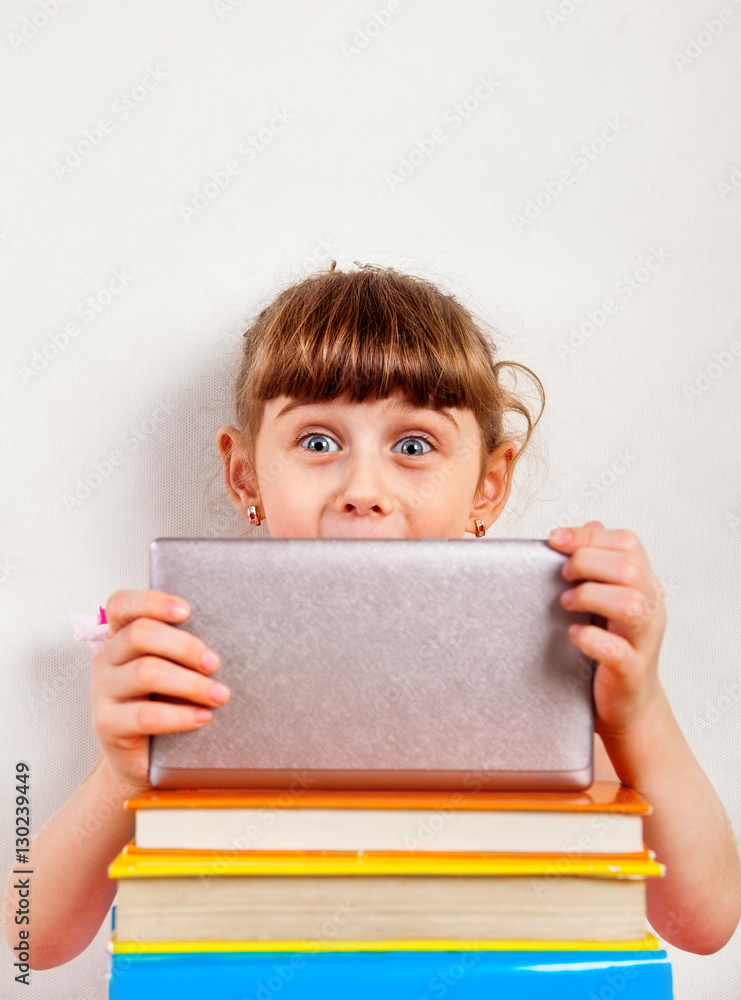 Small Girl with Tablet Computer Stock Photo | Adobe Stock