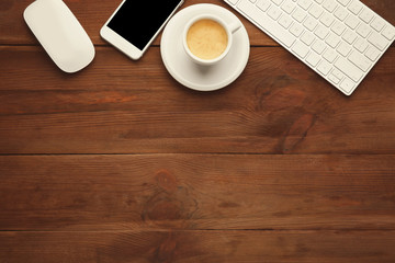 Sticker - Computer keyboard, phone and cup of coffee on wooden background