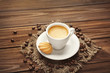 © Africa Studio - Cup of coffee and cookie on wooden background