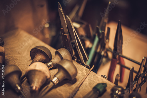 Fotomural Different goldsmiths tools on the jewellery workplace