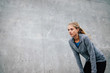 © Jacob Lund - Young sports woman taking break after a run