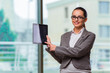 © Elnur - Woman working with tablet in office