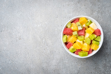 Sticker - Fresh fruit salad on gray stone table