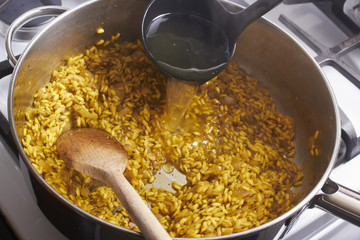 Risotto, Italian rice cooking in a pot