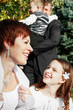 © delbars - Happy family at the wedding. Mom, dad, son and daughter. Family values