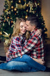 © saulich84 - young couple boy and girl in checkered shirts