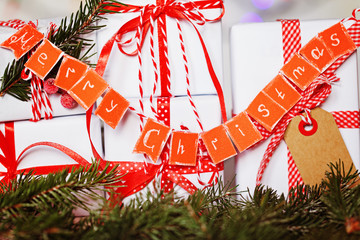 Wall Mural - Group Christmas white gift boxes with red ribbons and garland Merry Christmas.