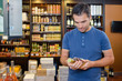 © auremar - man inside a beverage shop