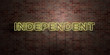 INDEPENDENT - fluorescent Neon tube Sign on brickwork - Front view - 3D rendered royalty free stock picture. Can be used for online banner ads and direct mailers..