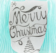 Merry Christmas hand drawn lettering with charcoal on blackboard framed by cyan curtains. Elegant unique design with snowflakes and Christmas tree.