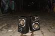 © fStop - Abandoned speakers on street at night