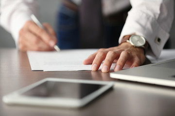 Wall Mural - Businessman signing documents