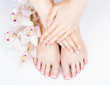 © Valua Vitaly - female feet at spa salon on pedicure and manicure procedure
