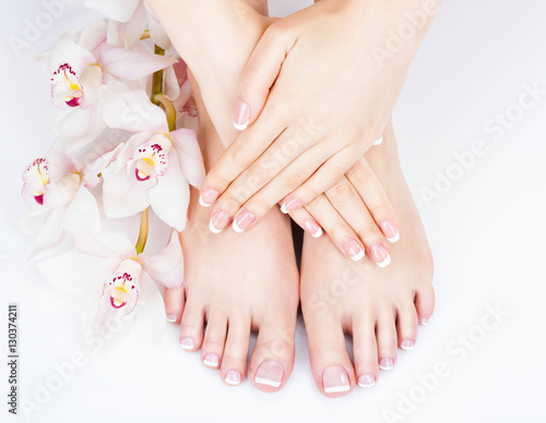 Obraz w ramie female feet at spa salon on pedicure and manicure procedure