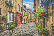 Charming Street Scene With Traditional Houses In Old Town In Europe