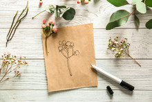 Paper With Drawing Of Hypericum Pink On White Wooden Background