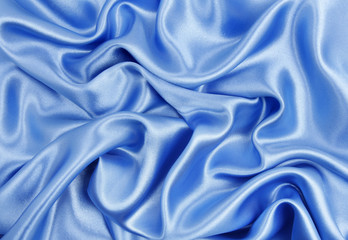 smooth elegant blue silk or satin luxury cloth texture as abstra