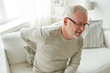 © Syda Productions - unhappy senior man suffering from backache at home