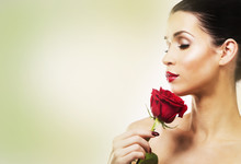 Romantic Woman Holding Red Rose On White Background