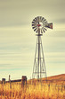 Retro toned windmill tower, American wild west symbol.