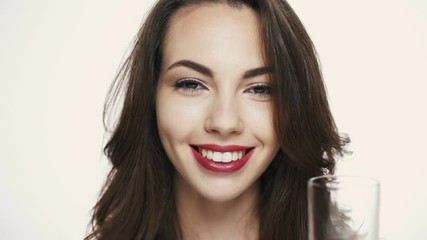 Sticker - Happy pretty woman with purple lipstick drinking glass of water 