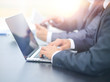 © ASDF - business people working with digital tablet and laptop