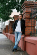 © DMITRY - Young man in the street.