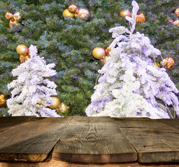 Wall Mural - christmas table background with christmas tree out of focus