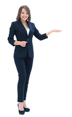 Wall Mural - Happy  young beautiful business woman showing blank area for sig