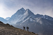© robertharding - Trekkers climb a small peak above Dingboche in the Everest region in time to see the sunrise, with Ama Dablam in the distance, Himalayas, Nepal