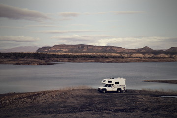 Wall Mural - Camper Parked on Lake Pleasant Shoreline with Vintage Effects