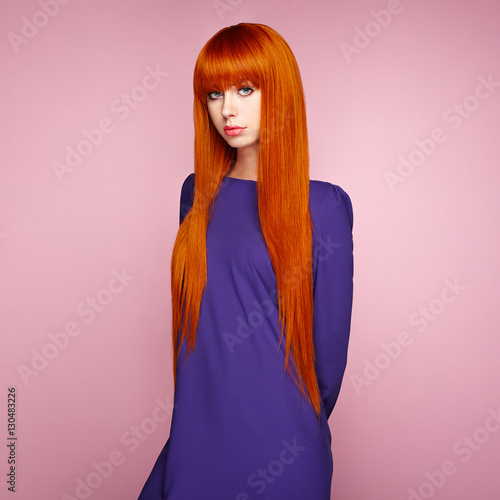 Portrait Of Beautiful Woman With Red Hair Colored Long