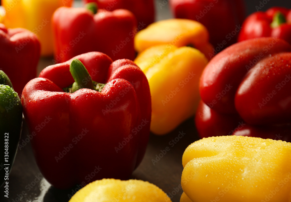 Red, green and yellow sweet bell peppers, closeup