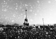 Paris cityscape with Eiffel tower at winter night in France. Vintage black and white soft focus picture. X-mas, Business, Love and travel concept