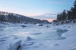 Frozen river/Frozen river and rocks covered with snow at sunset. Katun River, Mountain Altai, Siberia, Russia