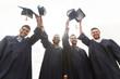 © Syda Productions - happy students or bachelors waving mortar boards