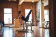 © Wavebreak Media - Woman practicing pilates in fitness studio