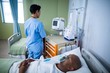 © WavebreakMediaMicro - Nurse looking at patient monitoring machine