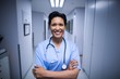 © WavebreakMediaMicro - Portrait of female nurse standing in corridor