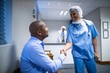 © WavebreakMediaMicro - Female doctor shaking hands with patient