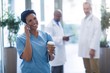 © WavebreakMediaMicro - Female doctor talking on mobile phone