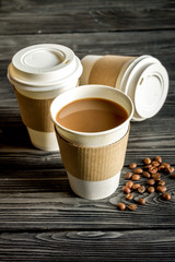 Wall Mural - coffee cup take away at wooden background