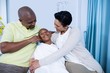 © WavebreakMediaMicro - Smiling parents interacting with patient