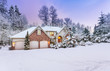 © Jo Ann Snover - Driveway view of snowy home - daylight fades over a snow-covered suburban home