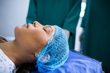 Patient lying on operation bed