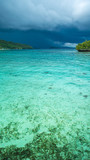 Fototapeta Do akwarium - Beautiful Blue Lagoone shortly before Thunderstorm, Gam Island, West Papuan, Raja Ampat, Indonesia
