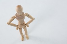 Wooden Figurine Standing With Hands On Hip