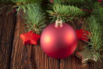 Sticker - Red Christmas ball on wooden table