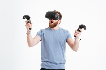 Sticker - Surprised bearded young man wearing virtual reality device