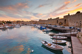 Fototapeta  - Old harbor and city walls of the medieval town of Rhodes.